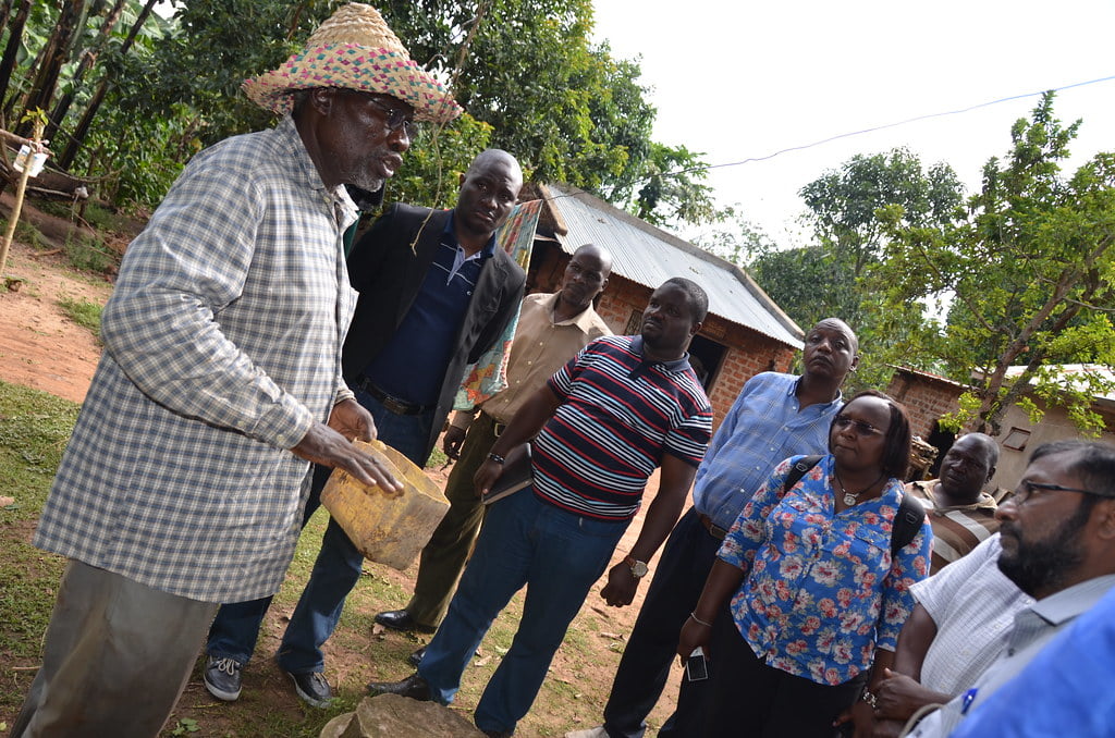 Farmer educates participants on his biogas farming model